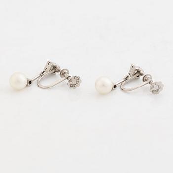 Cultured pearl and diamond earrings.