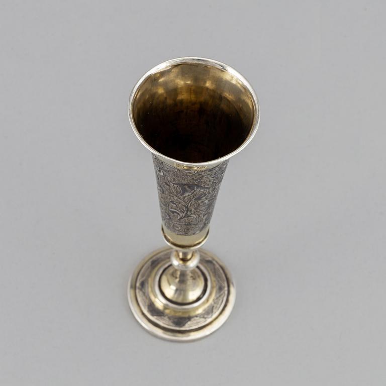 A Russian silver gilt and niello champagne flute, unidentified makers mark, Moscow 1843.