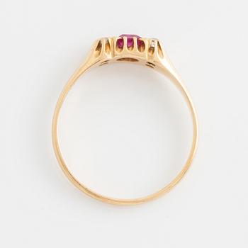 Ring, gold with synthetic pink stone and small white stones.