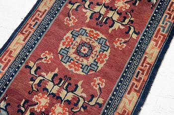 Carpet, antique China, approx. 128 x 67 cm.