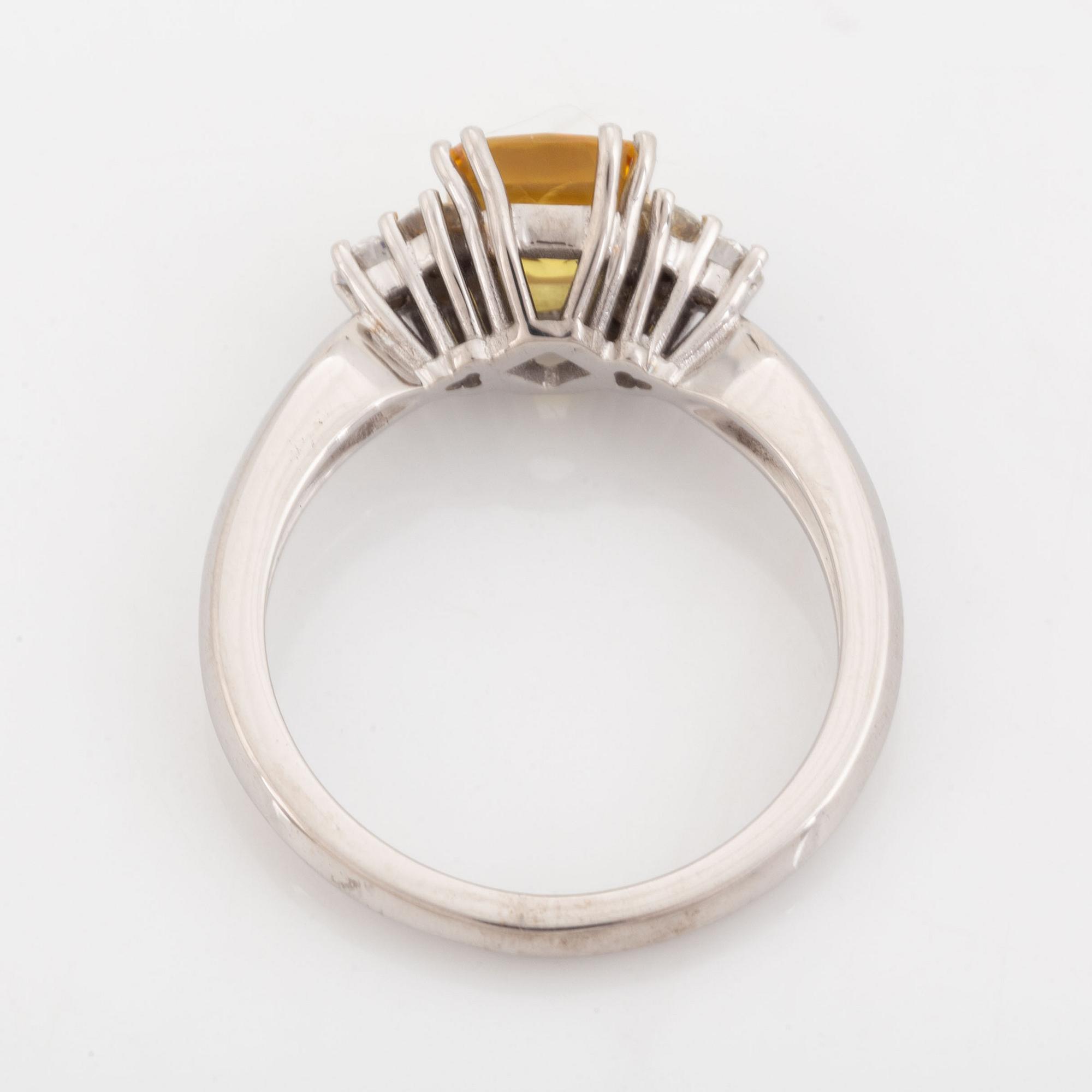 Yellow sapphire and diamond ring.