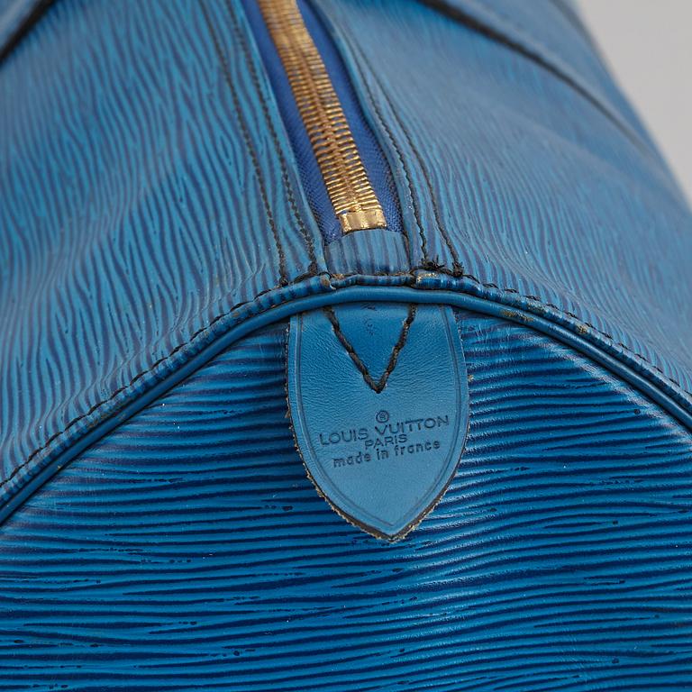 LOUIS VUITTON, a 'Keepall 55 Epi' weekendbag.