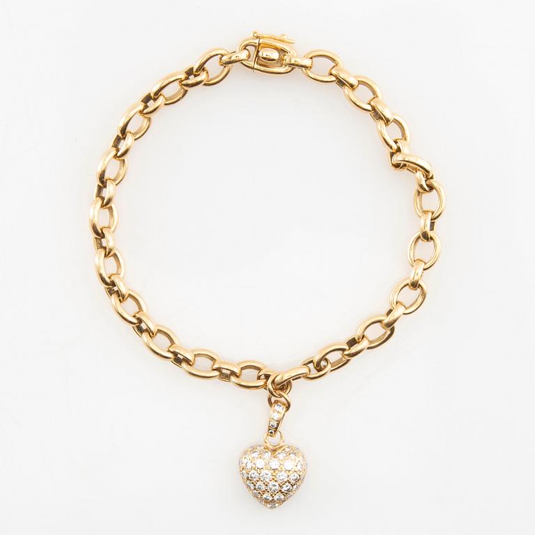 Cartier, Armband av 18K guld med runda briljantslipade diamanter.