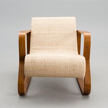 An armchair manufactured by Oy Huonekaluja Rakennustehdas Ab in 1932.