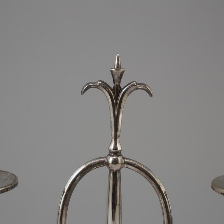 a pair of Elis Bergh silver plated candelabras, Swedish grace, CG Hallberg, Stockholm, 1920s.