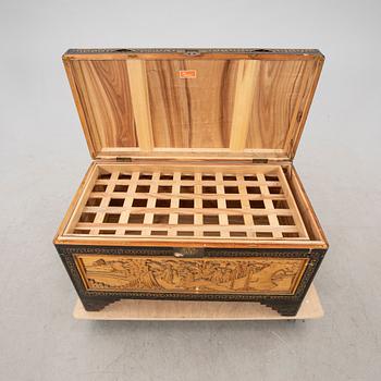 An Asian wooden coffin 20th century.