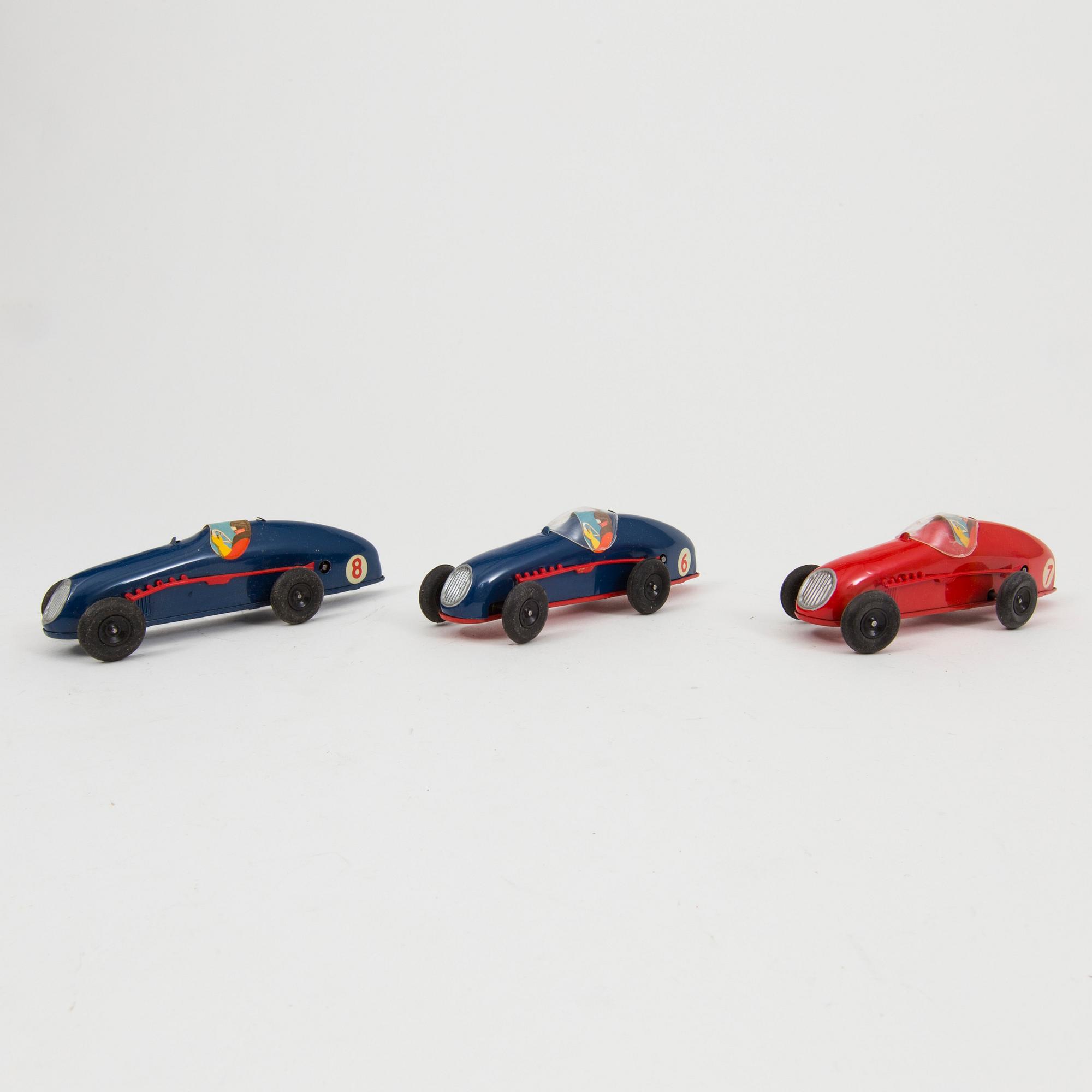 Nine Tri-Ang Minic Toys cars England 1950s.