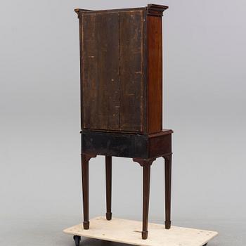 A mahogany cabinet, England, late 19th / early 20th century.