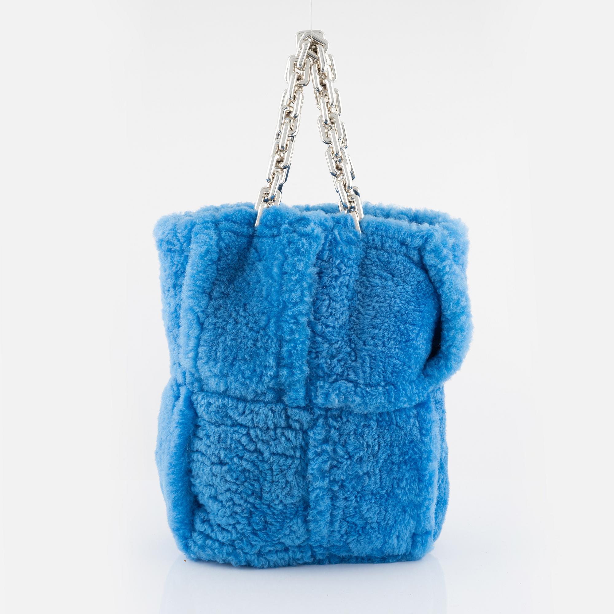 Bottega Veneta, A blue shearling intrecciato 'The Chain Tote'.