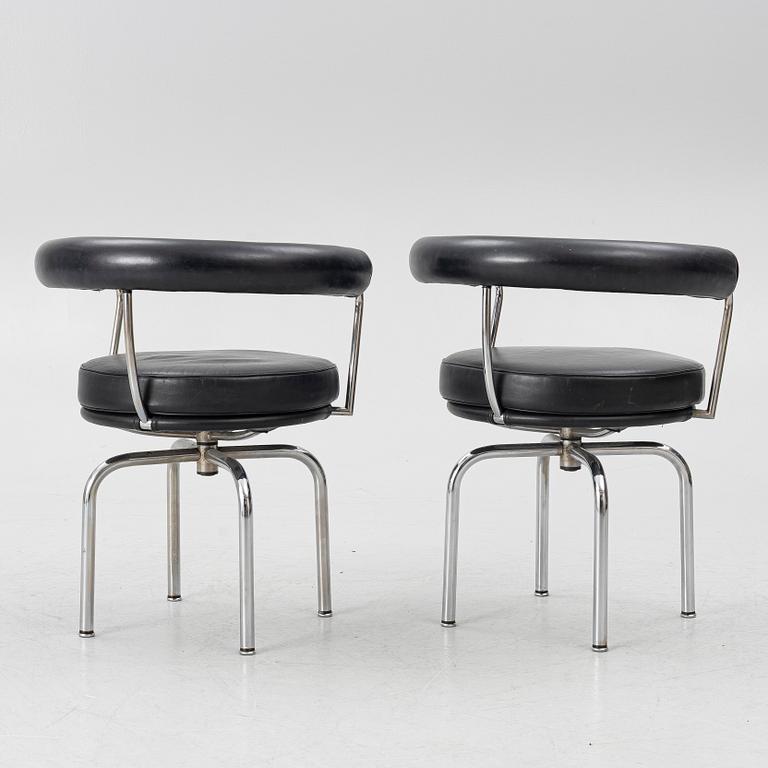 Charlotte Perriand, /Le Corbusier, swivel armchairs, a pair, model LC7, Cassina, Italy, later part of the 20th century.