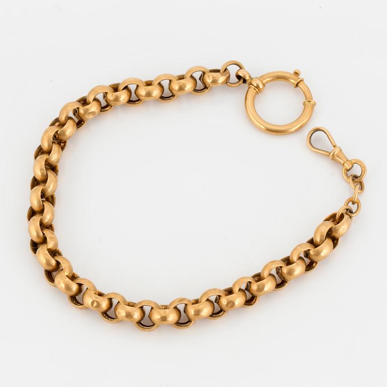 A 18 k gold pocket watch chain, dated 1927.