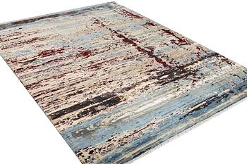 An oriental carpet with modern design, ca. 377 x 277 cm.