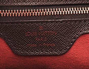 A damier handbag from Louis Vuitton.