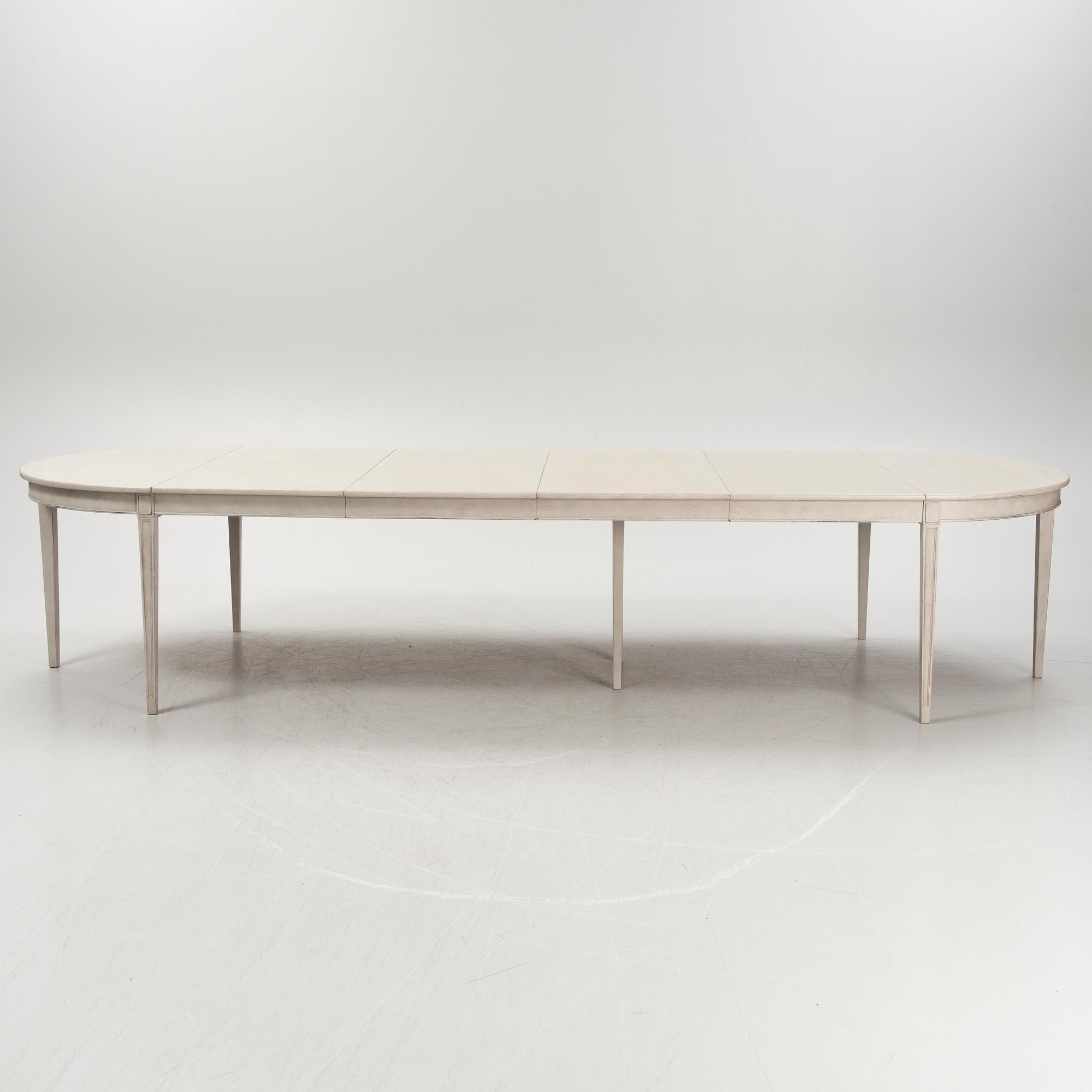 A Gustavian style dining table, first half/mid 20th century.