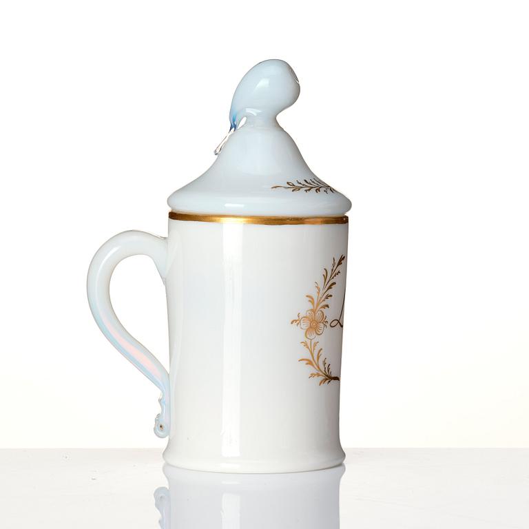 A white glass tankard with cover, possibly Strömbäck, circa 1800. Monogram LL.