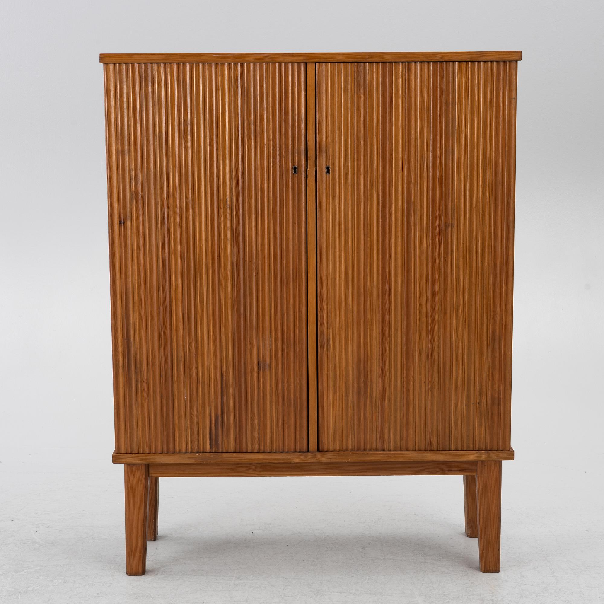 Swedish Modern, a pine cabinet, mid-20th century.