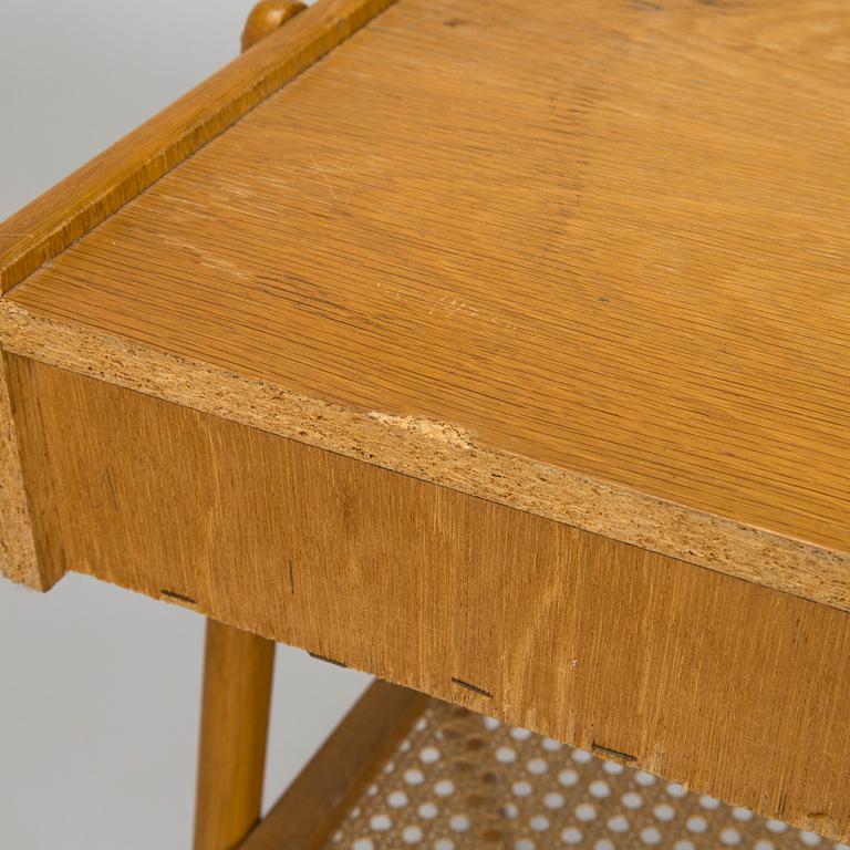 A pair of 1960's bedside tables.