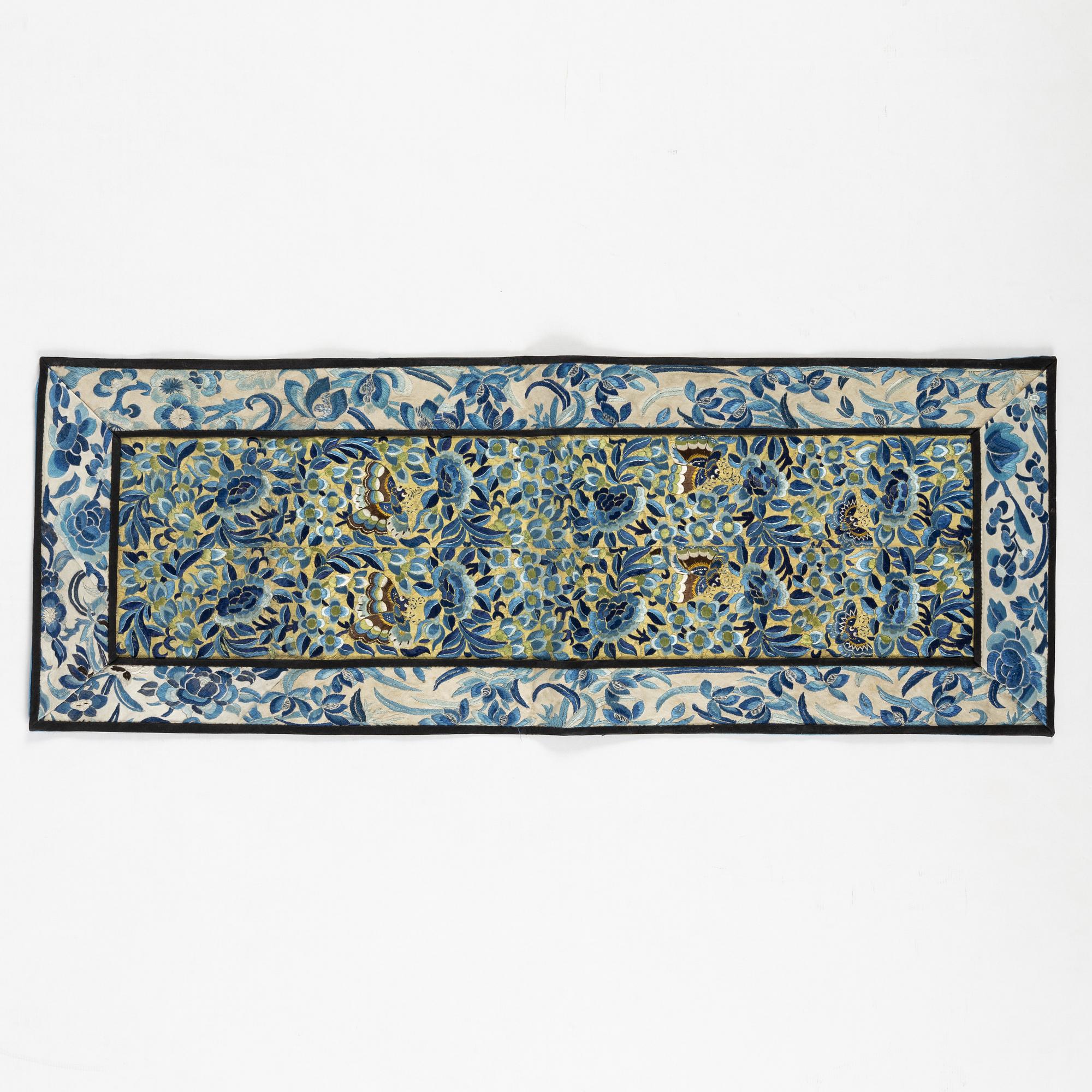 A collar a vest and two Chinese embroidered silk textiles, late Qing dynasty / early 20th century.