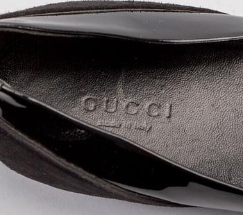 SKOR, Gucci.
