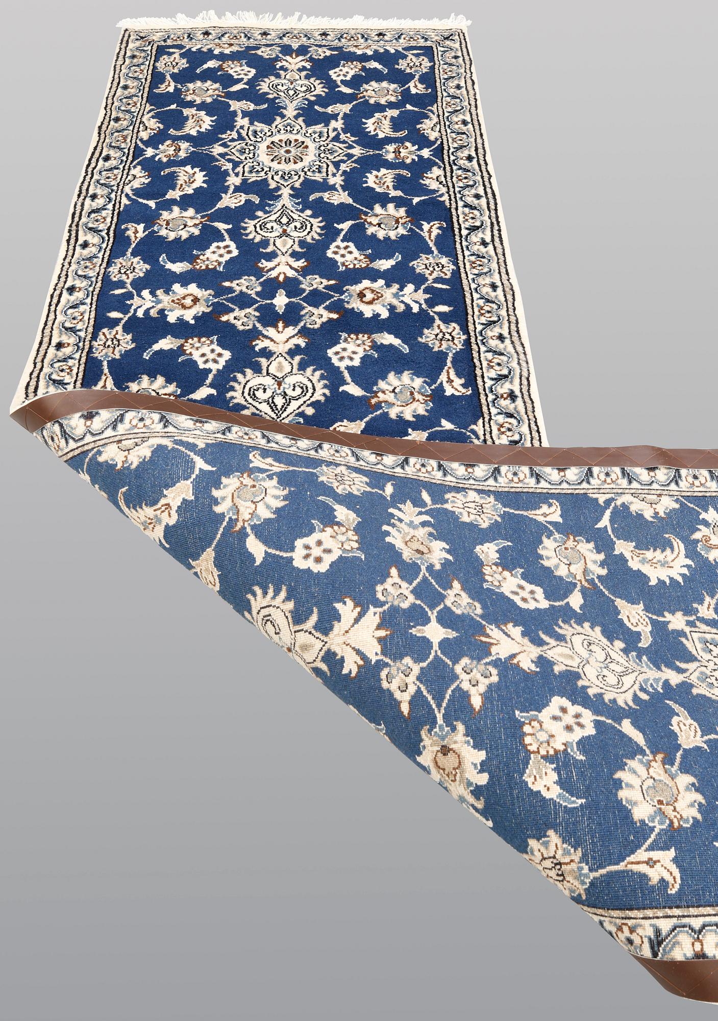 A Nain runner, ca 289 x 79 cm.