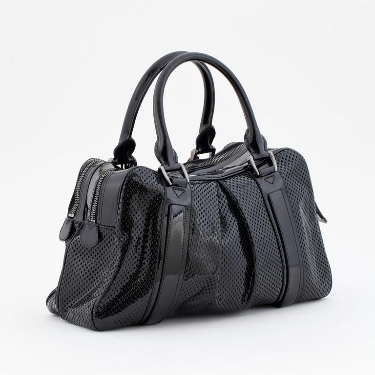 BURBERRY, a black patent leather bag.