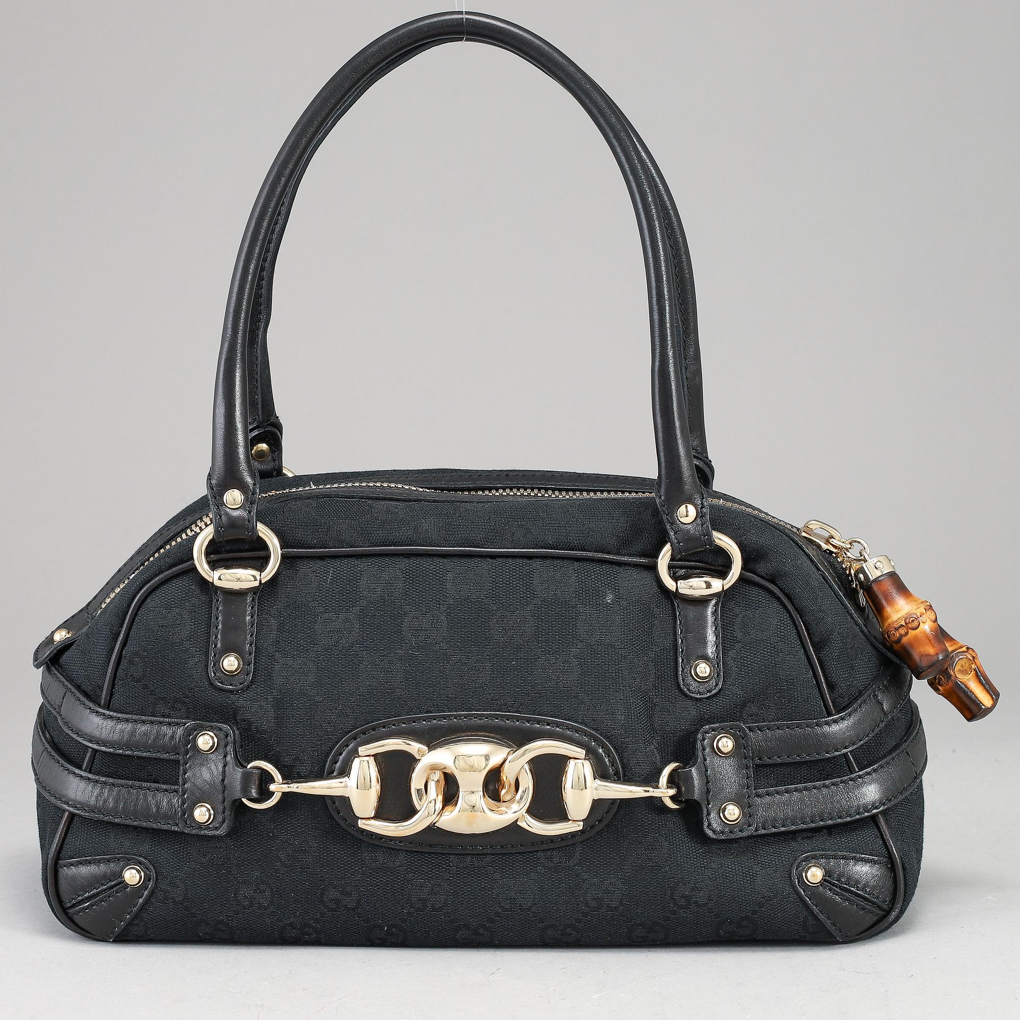 GUCCI, 'GG Canvas Horsebit Wave Handbag'.