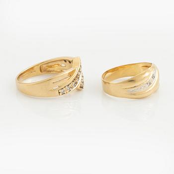 18K gold and diamond rings.