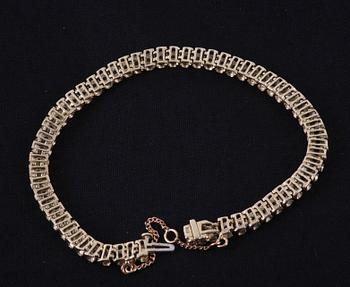 ARMBAND, 14 K guld samt briljanter, 11 g.