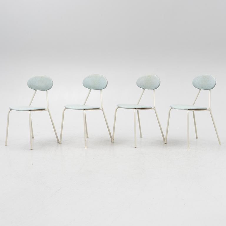 A table and four chairs, mid-20th Century.