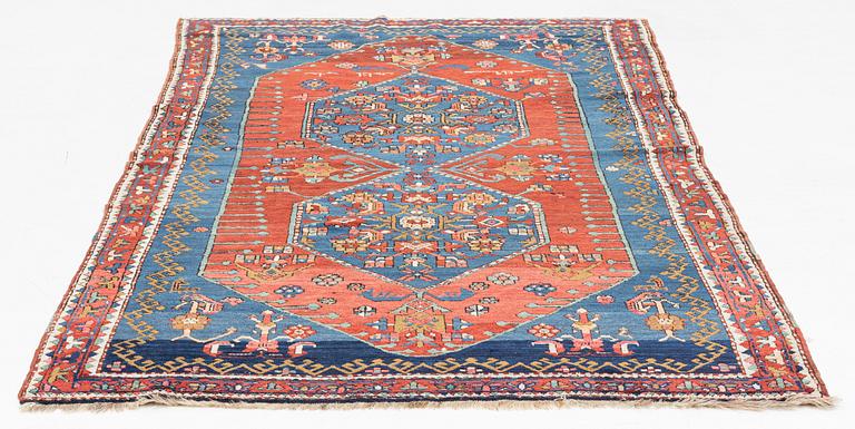 An antique carpet from south caucasus, probably Karabagh, ca 261 x 146 cm.