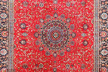 A Kashan carpet, c. 400 x 297 cm.