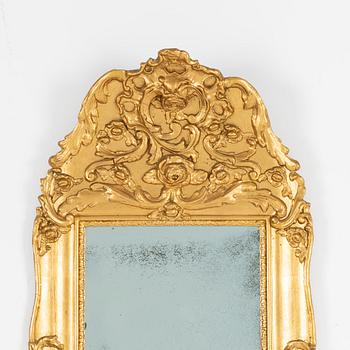 A Rococo style mirror, 19th Century.