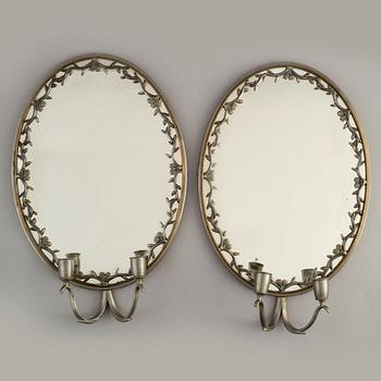 A pair of pewter wall sconces, Firma Svenskt Tenn, model no 245, Stockholm 1928.