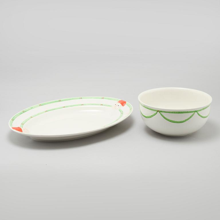 A 20th century set of earthenware tableware of 21 pcs by Gustavsberg.