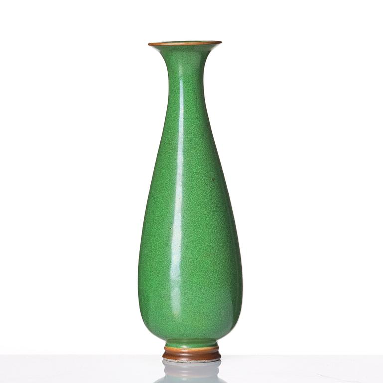 A Chinese apple-green-glazed vase, Qing dynasty.