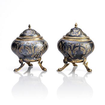 A pair of Russian silver-gilt salt-cellars with lid, assay master Andrej Titow, Moscow 1797.