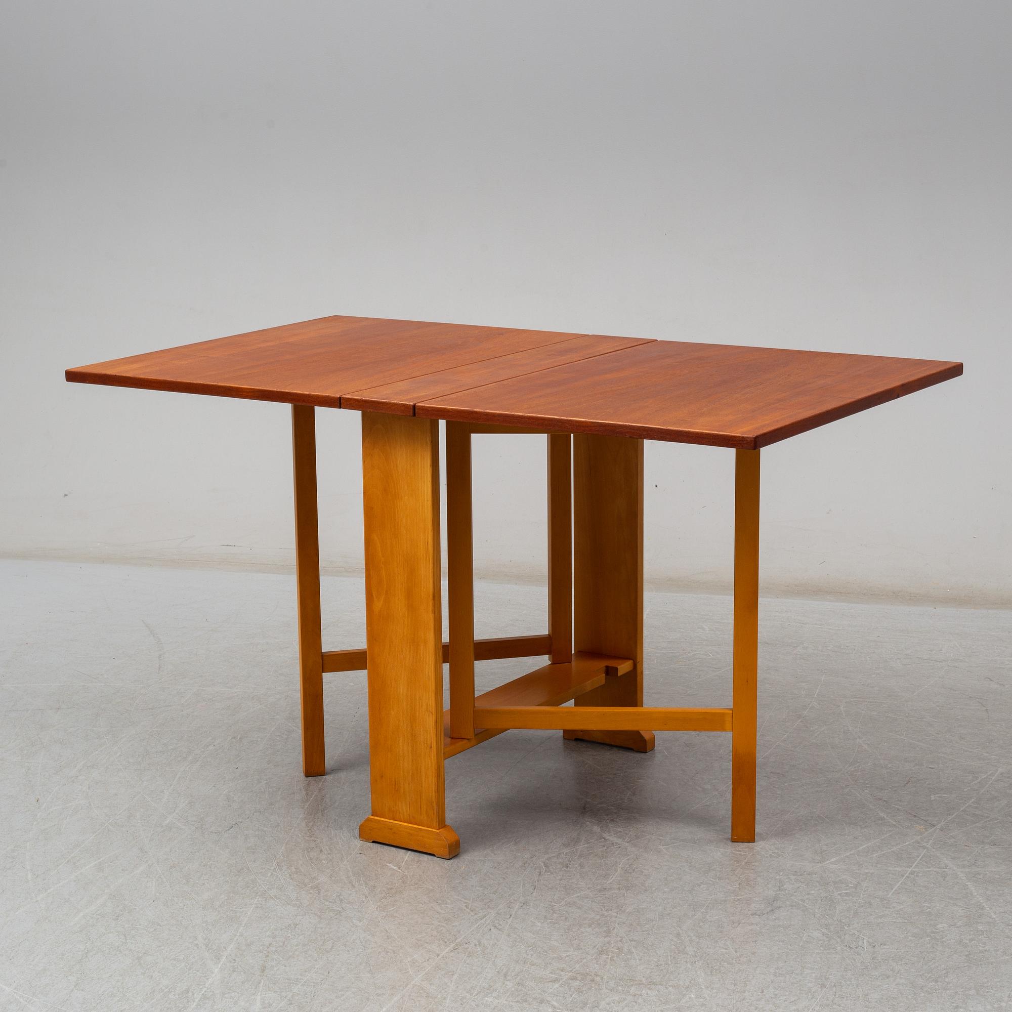 A gate leg table 'Vapensmeden' by Carl Malmsten,