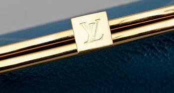 A blue leather purse by Louis Vuitton.