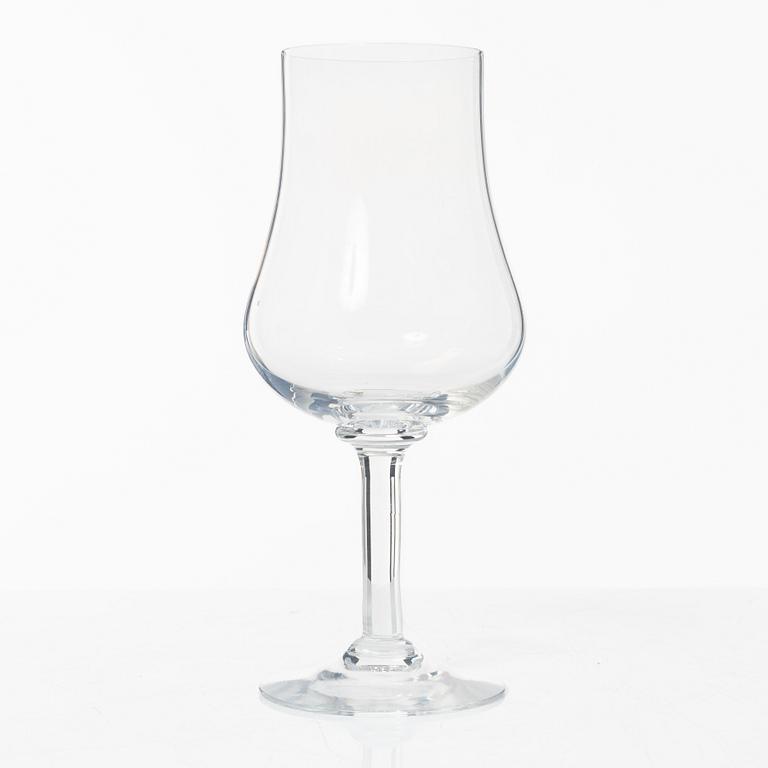 A set of 46 glass service parts, including 'Elixir Connoisseur' and Gunnar Cyrén, 'Optica', Orrefors.