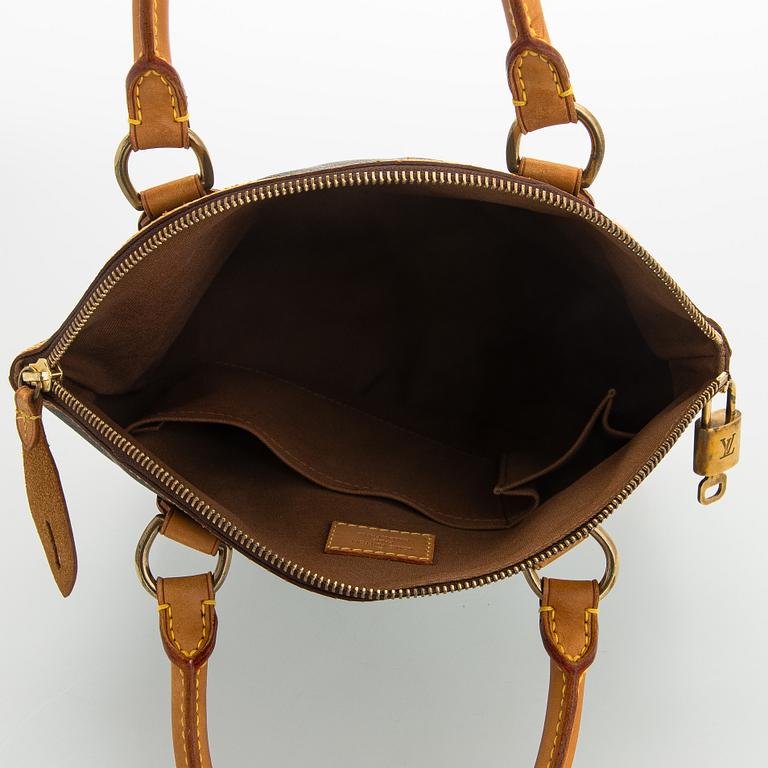 Louis Vuitton, a 'Lockit PM' bag.