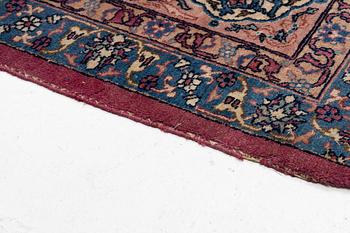 An antique Tabriz carpet, West Persia, c. 447 x 322 cm.