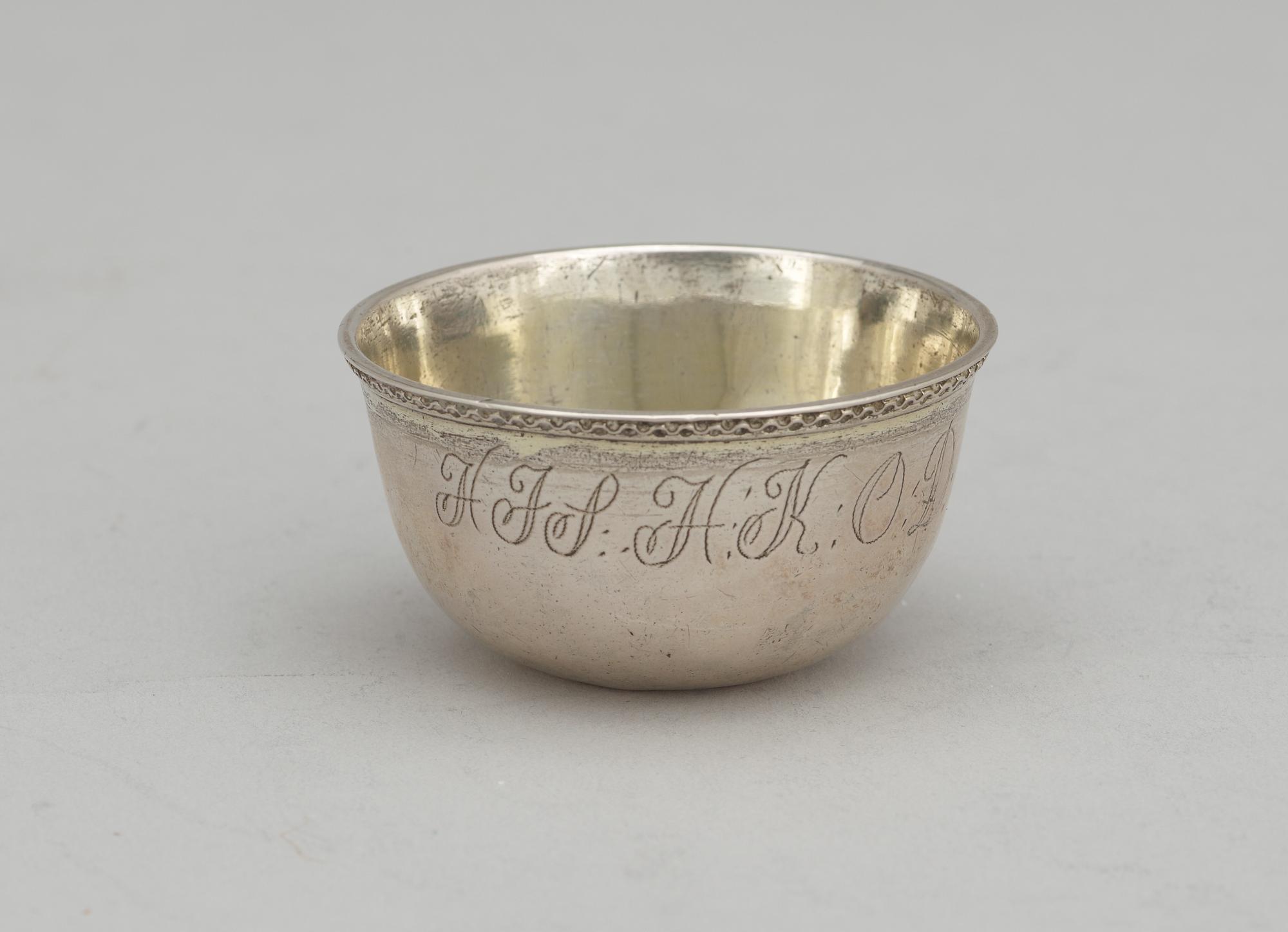 A Swedish 18th century parcel-gilt thumbler, makers mark of Johan Wickman, Hudiksvall (1750-1755 (1758)).