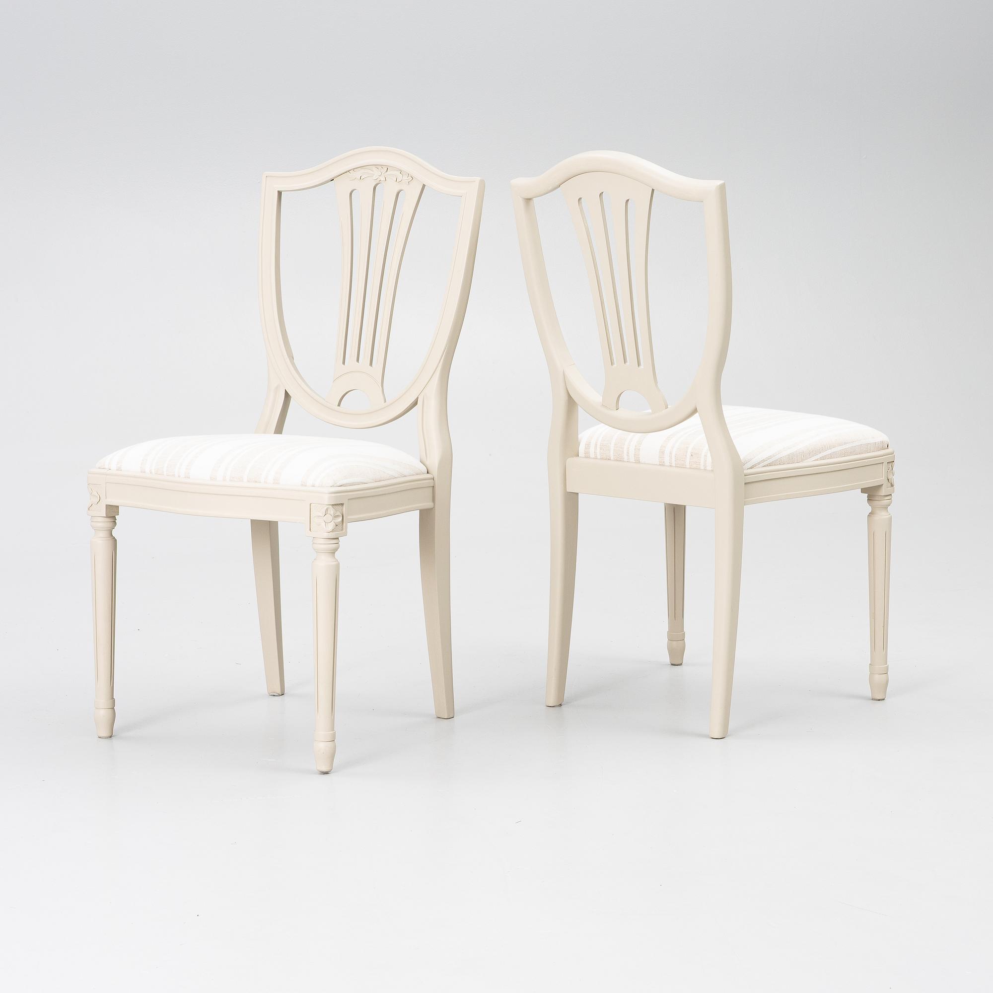 A dining table with 10 chairs, Gustavian Style dining suite, second half of the 20th century.