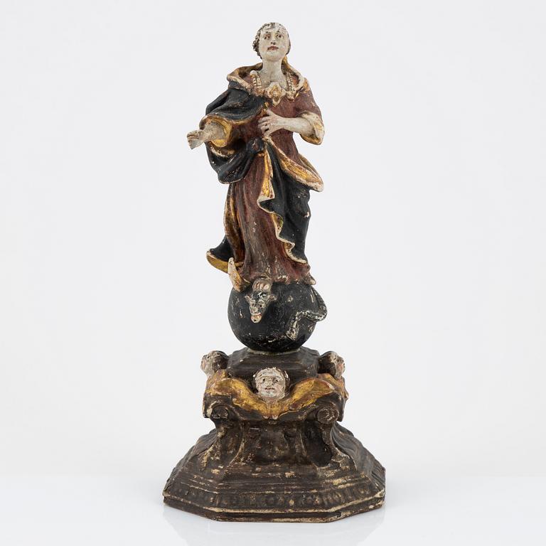 A carved and painted figure of the Virgin Mary crushing the Serpent, Southern Europe, 18th/19th century.