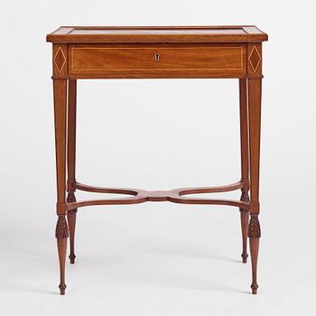 A late Gustavian mahogany table attributed to L. Qvarnberg (master in Stockholm 1801-1813).