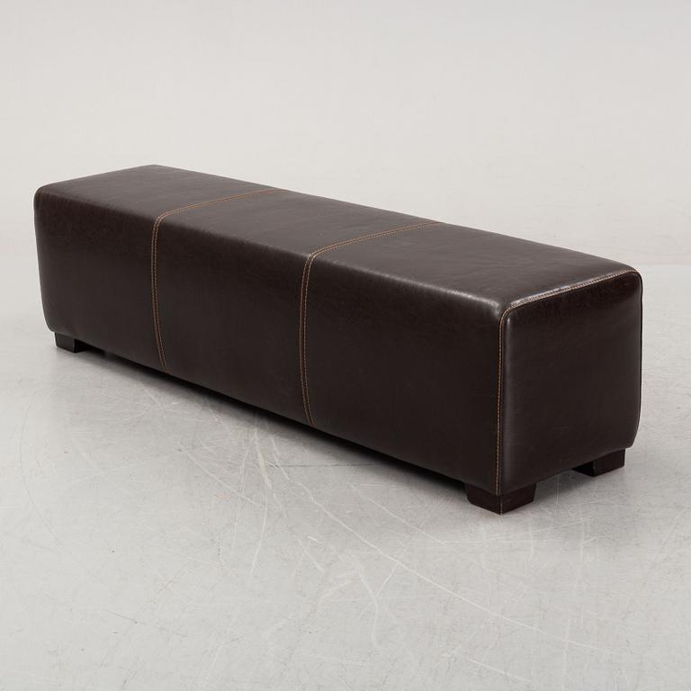 A leather-upholstered bench from Industria Divani e Poltrone, Italy.