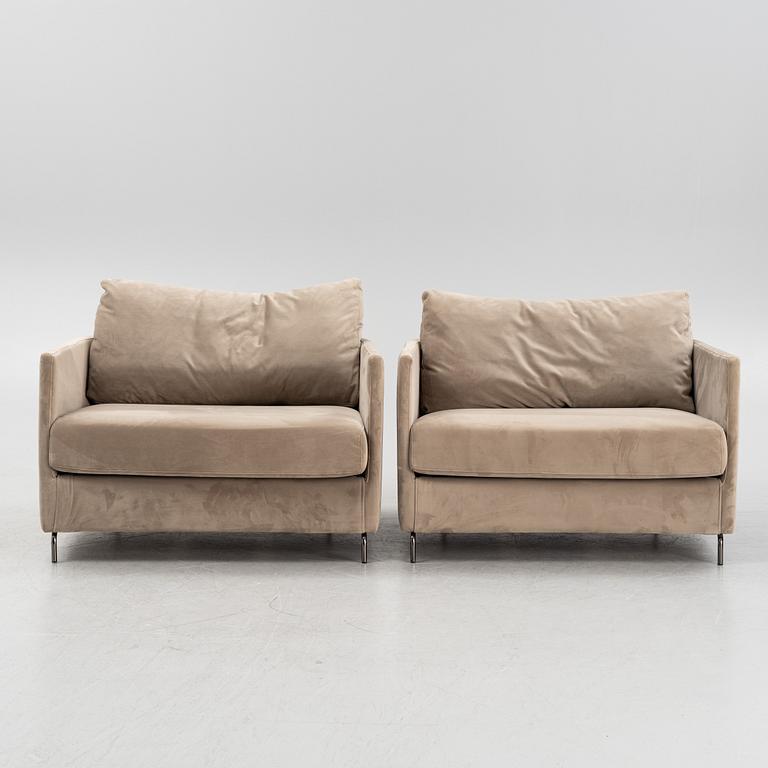A pair of armchairs, 21st Century.