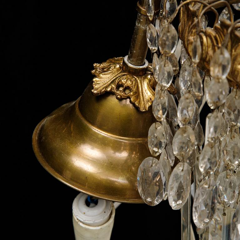 An Oscarian gilt brass eight-light chandelier.