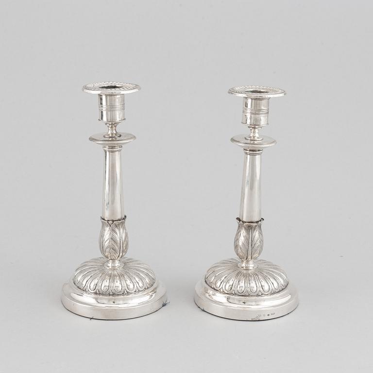 Gustaf Möllenborg, a pair of silver empire candlesticks, Stockholm 1829.