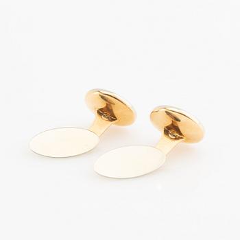 Manschettknappar, ett par, 18K guld med pärlemor och runda briljantslipade diamanter.